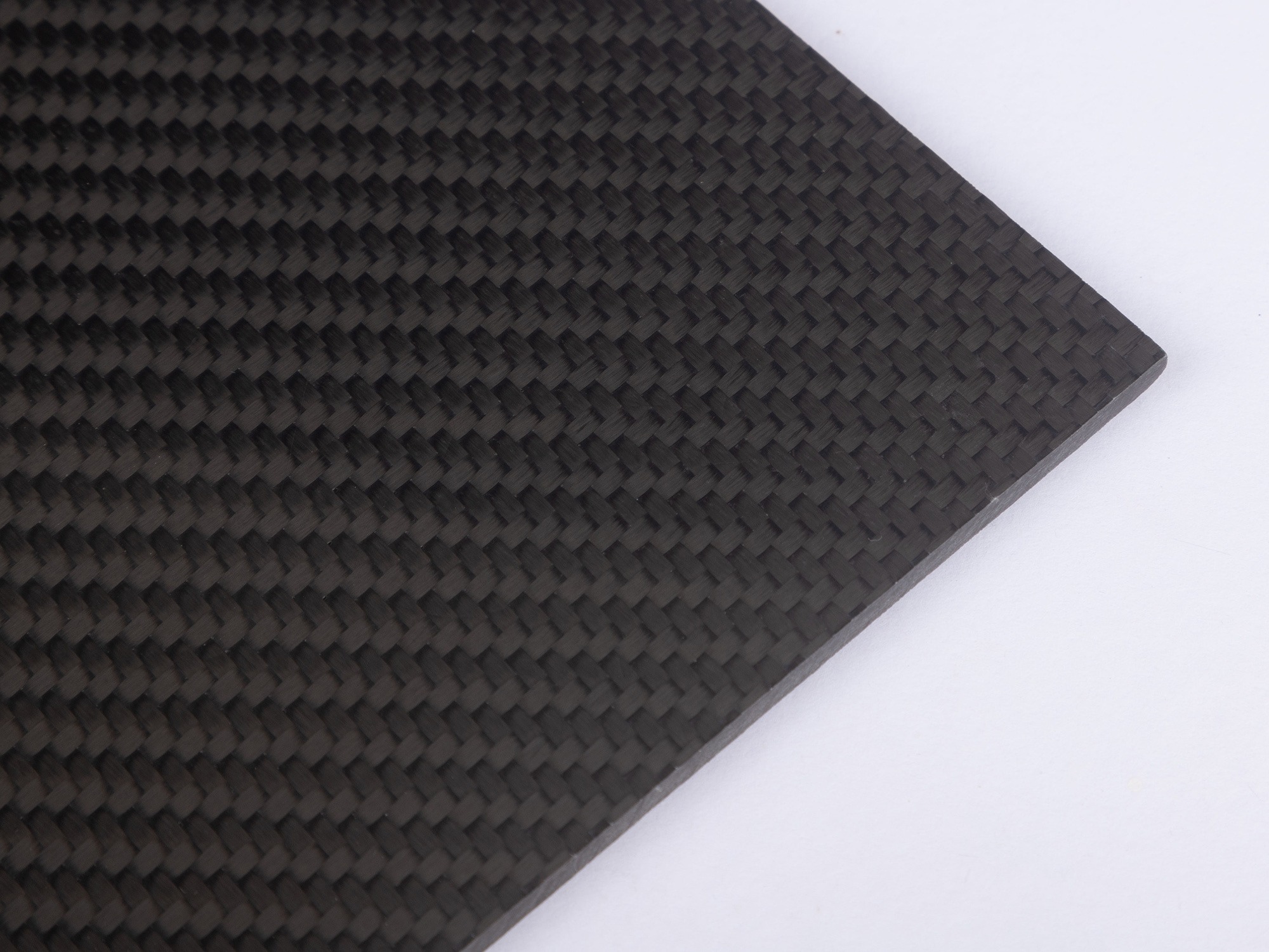Unbranded carbon-fiber laminate panel for custom composite core context