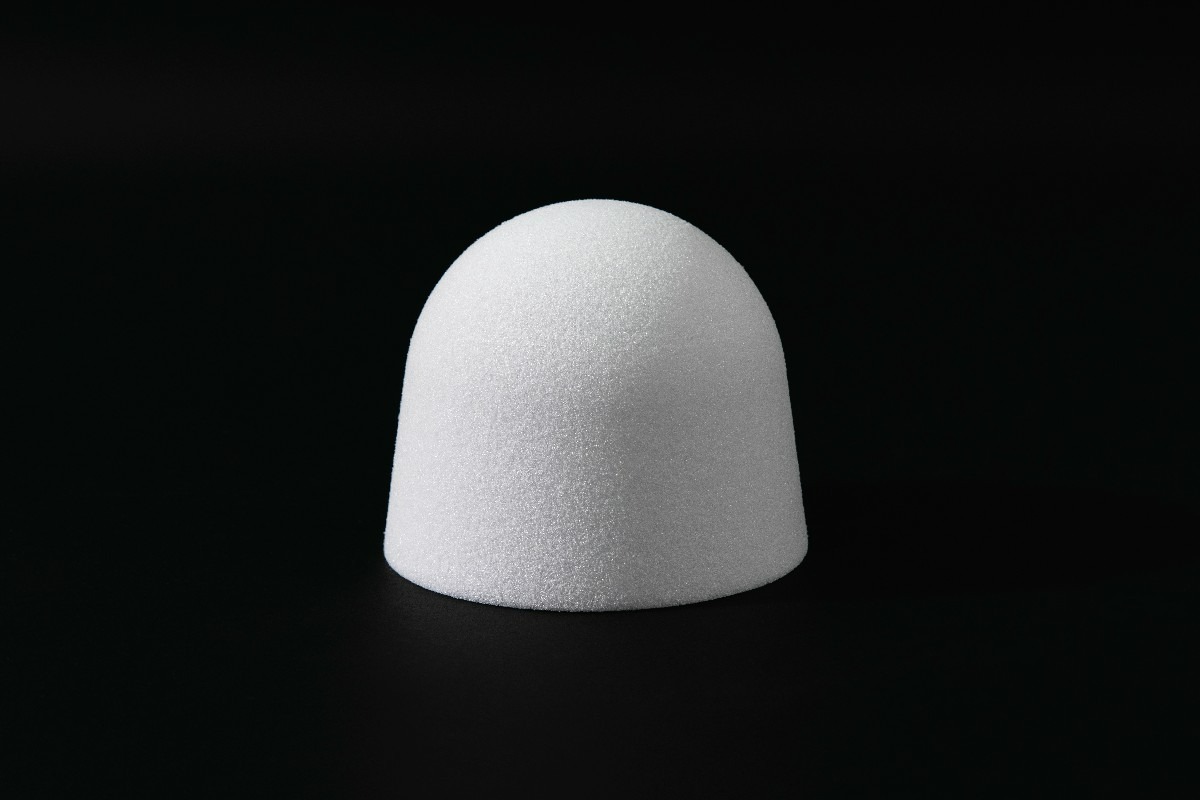 Curved white radome-shaped foam form